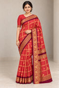 Coral Red Checked Saree with Burgundy Brocade Border – styled model photo
