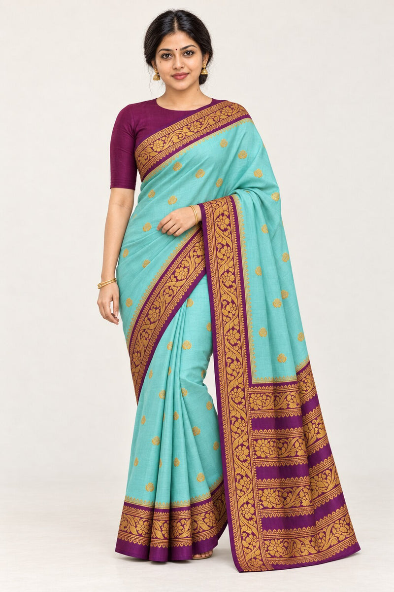 Aqua Lotus Butti Saree with Plum Vine Border – worn